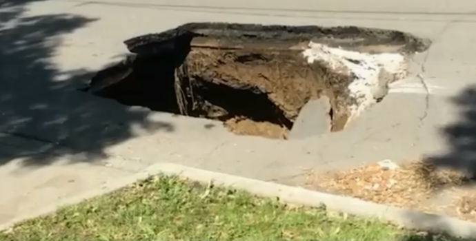 The sinkhole, located on Southwest 12th street and Thornton Avenue, was estimated to be about 35 feet deep.