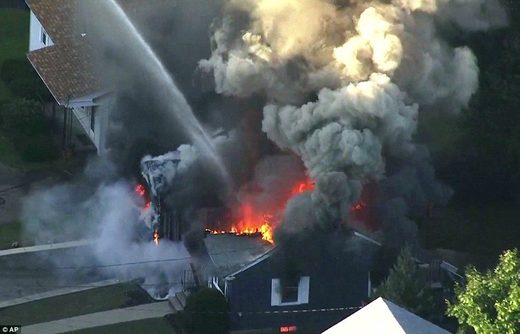 More than 50 properties explode in flames in three Boston suburbs after 'gas main meltdown'