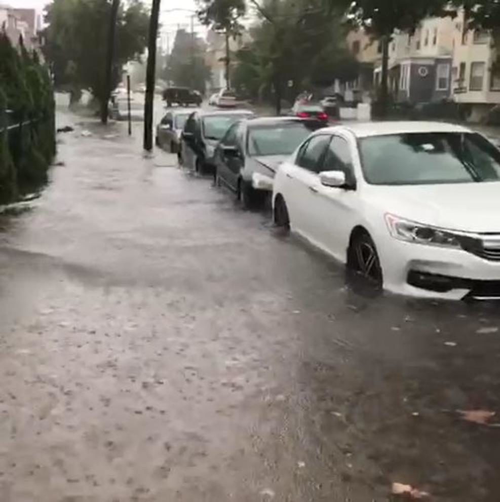 Click to enlarge A flooded sidewalk near 34th Street and Avenue E in Bayonne.