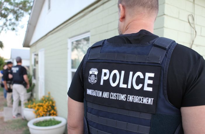 ICE immigration police migrant