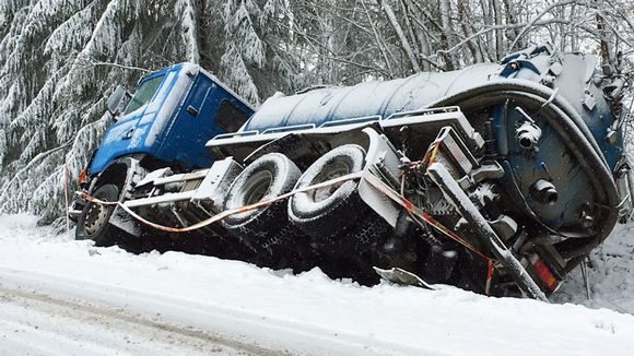 A lorry that slid off the road into a ditch