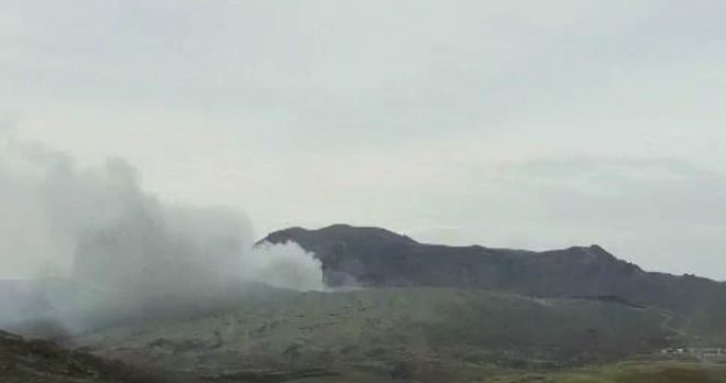 Smoke and ash spews out of Mount Aso in Kumamoto Prefecture on April 16.