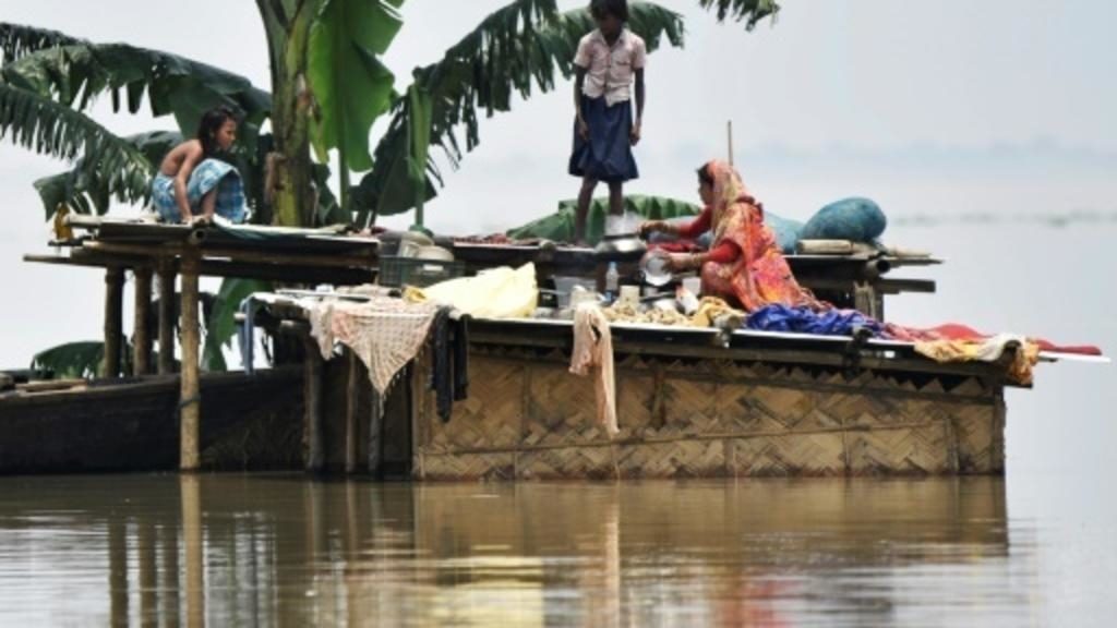 In India, heavy rains since the start of July have killed at least 467 people with many districts in Uttar Pradesh, Bihar and Assam (pictured) states cut off because of flooding