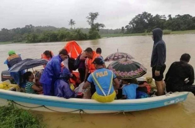 Rescuers help residents displaced