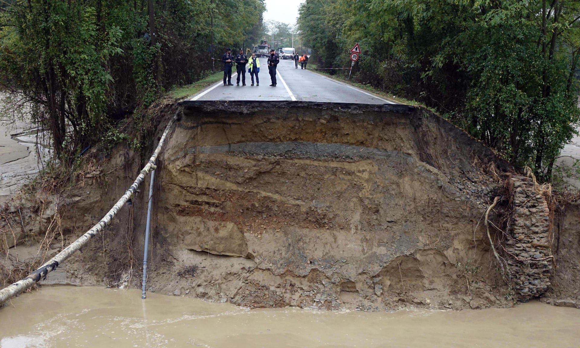 collapsed road from flooding Piedmont, Italy