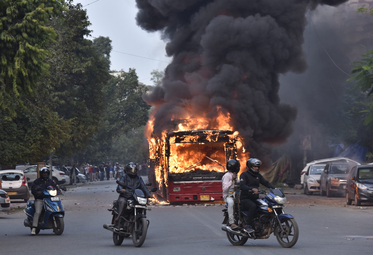 bus burning protest india