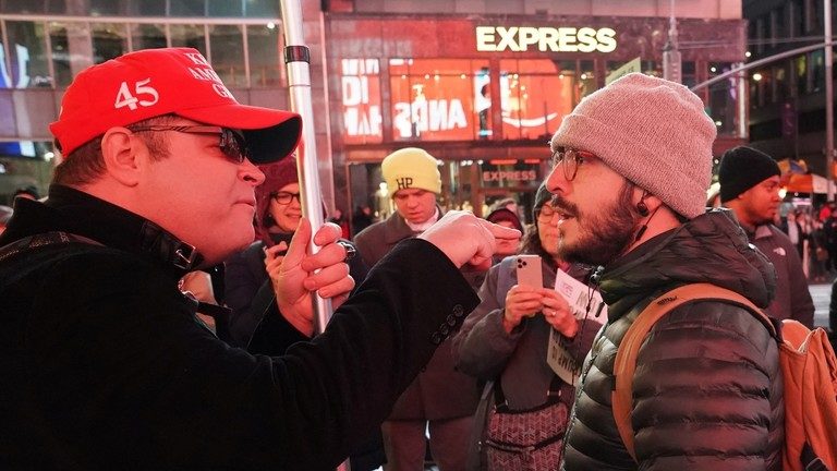 trump supporter argues with trump protester