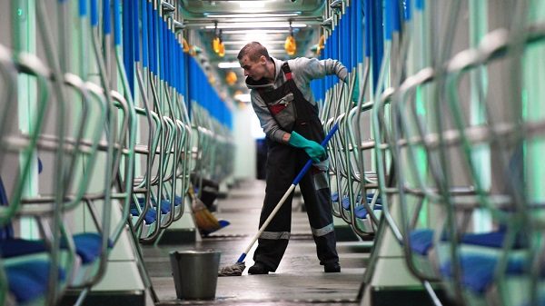 Worker disinfects a Moscow metro car