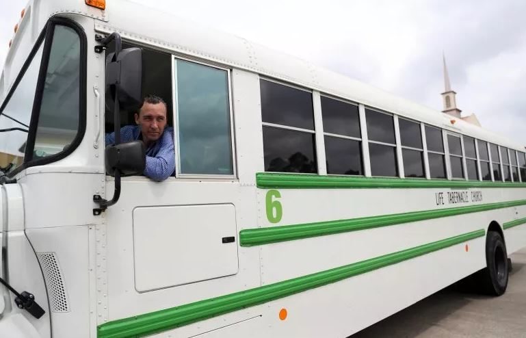 Tony Spell in a bus