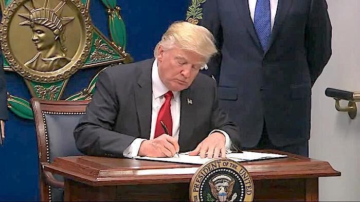Trump signs