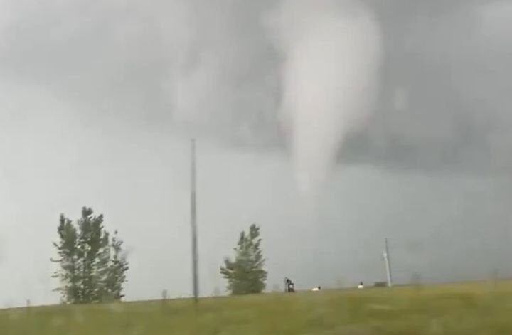 Much of Alberta experienced turbulent weather on Tuesday night and a mother from Brooks said she was frightened by a funnel cloud next to the highway her family was travelling on around the same time a tornado alert was in effect for the area.