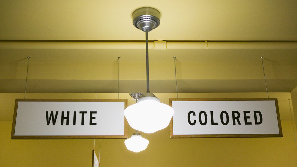segregation signs black white