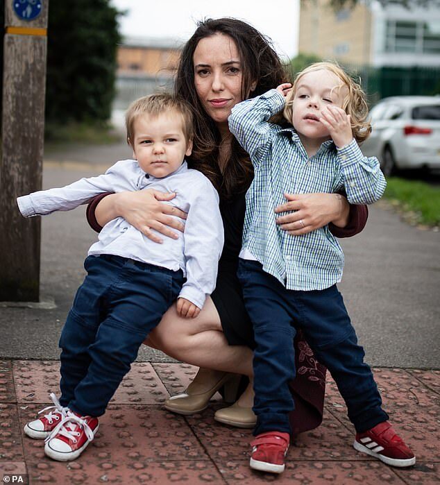Stella Moris with children Gabriel and Max
