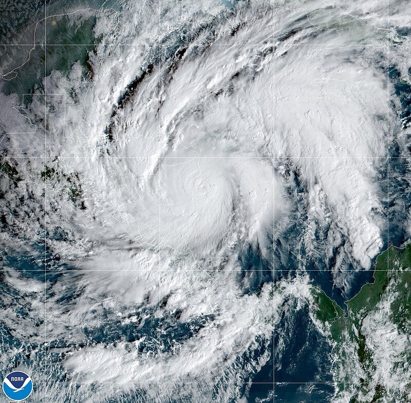 This GeoColor satellite image taken Tuesday, Nov. 3, 2020, and provided by NOAA, shows Hurricane Eta in the Caribbean Sea, arriving at Nicaragua's northern shore. Eta inched closer on Tuesday as a Category 4 storm.