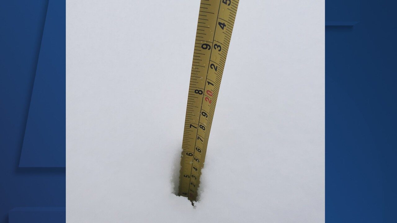 Image of measuring tape in snow in Cuyahoga County from winter storm on Dec. 1, 2020.
