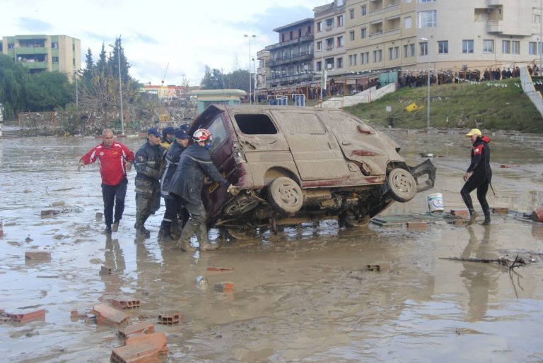 Algeria Civil Protection work to clear debris including damaged vehicles after the floods in Jijel, Algeria 21 December 2020