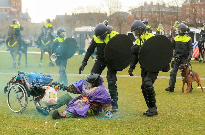 female protester Netherlands, anti-lockdown protester