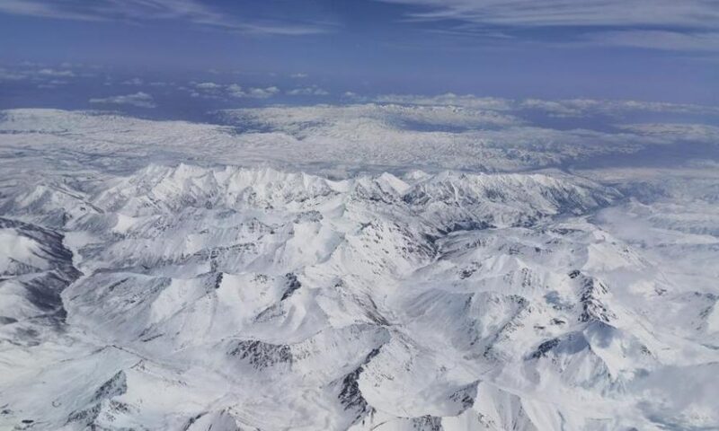 The photo captured on May 23, 2021 shows a snowfall on the Qilian Mountains,