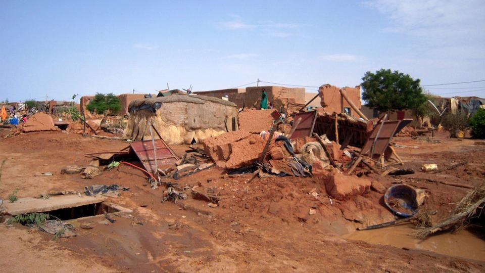 File Photo: A general view shows ruins of houses destroyed by floods in Agadez, a market town northeast of Niger's capital Niamey, on September 3, 2009