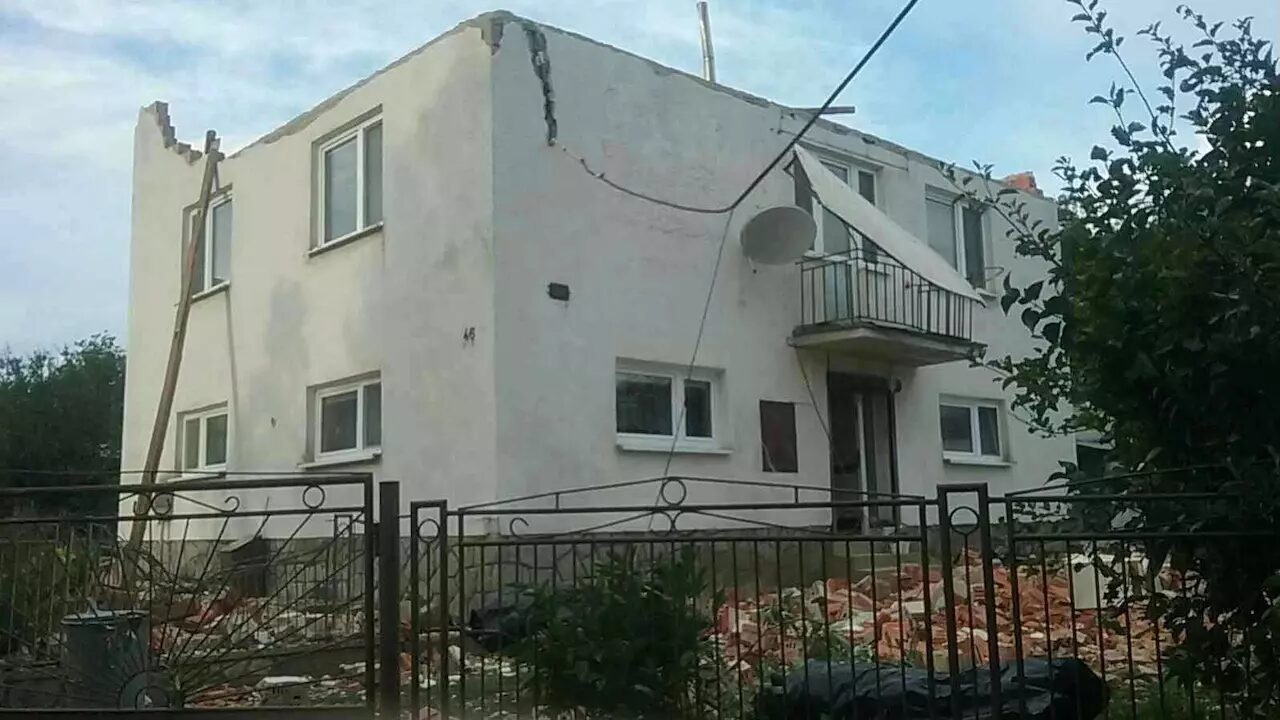 Click to enlarge The house in the Slovak village of Petkovce lost its roof during a tornado rampage.