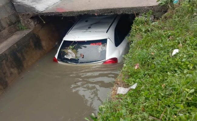 A car submerged in water in Telangana's Hanumakonda