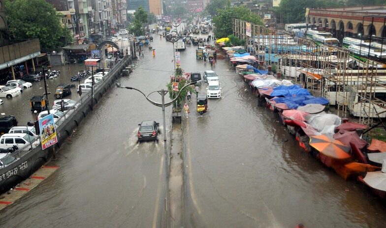 An inundated road outside the Shaheed Madan Lal Dhingra Inter-State Bus Terminal in Amritsar on Friday