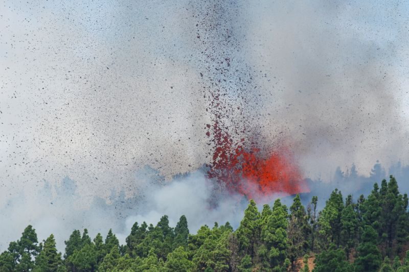 Lava and smoke are seen followng the eruption of a volcano in Spain