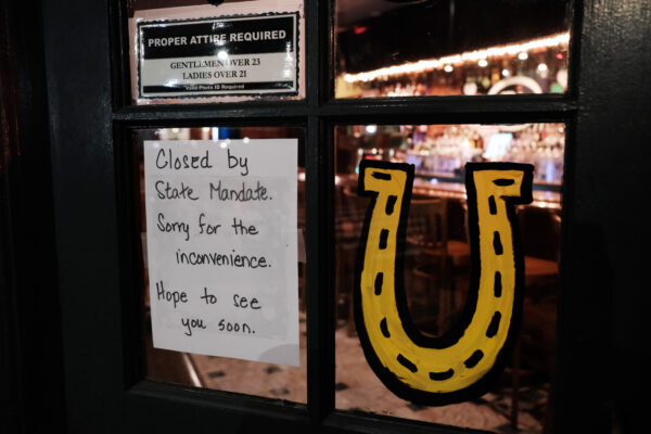 A Brooklyn restaurant sits closed in the early evening after a decree that all bars and restaurants shutdown