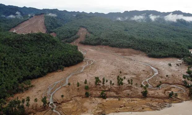 An aerial view of a landslide that hit a village in the Philippines’ Leyte province amid heavy rain from tropical storm Megi.