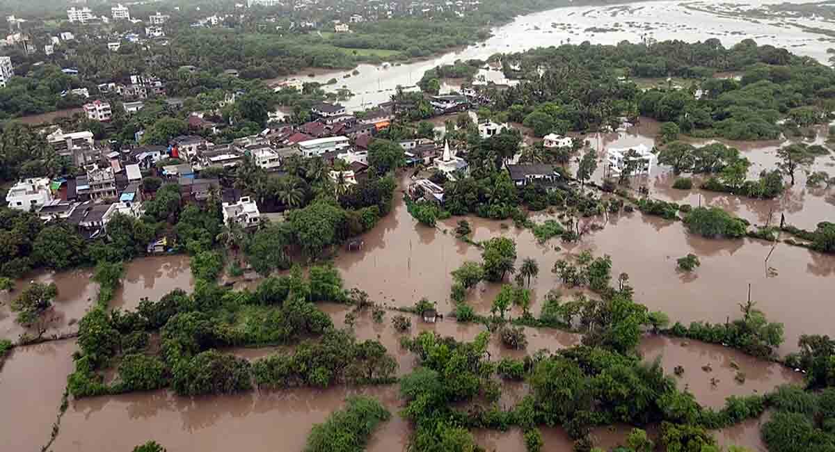 Aerial view of flood affected areas as many parts of the district inundate amid heavy rainfall, on Monday.