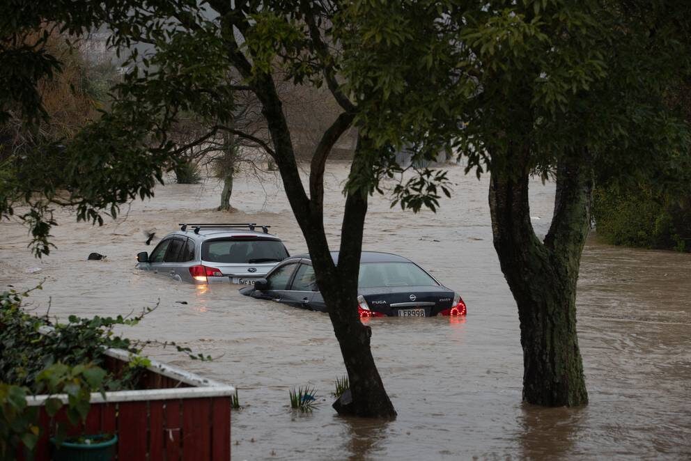Cars stranded near the Maitai River.