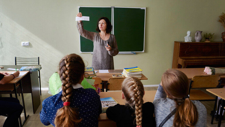 Teacher and students in a classroom