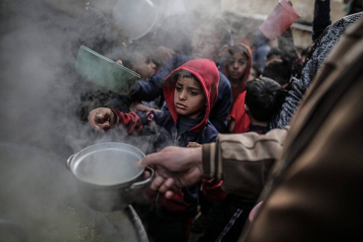 gaza soup line children israel weaponize food