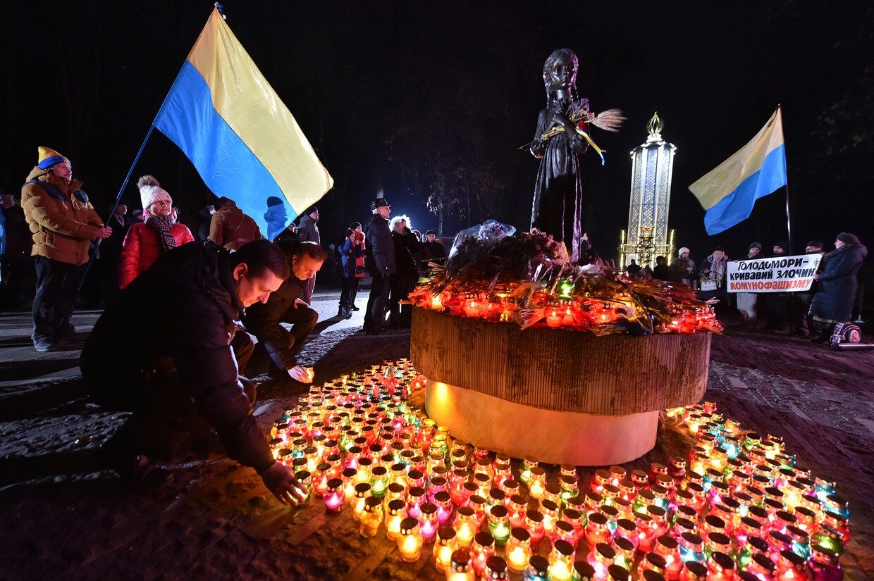 People light candles in memory of the victims of the Holodomor famine