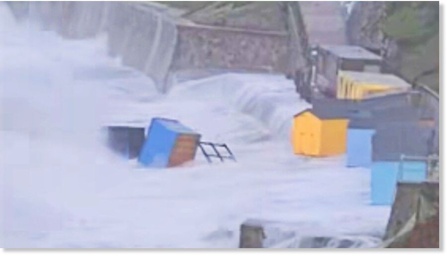 Beach huts washed into sea as storm sweeps in