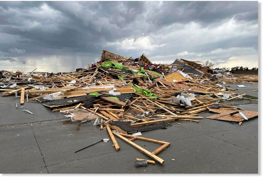 Debris is seen from a destroyed home northwest of Omaha, Nebraska, after a storm tore through the area on Friday