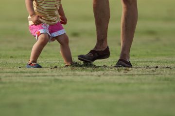 Click to enlarge A young child and her mother