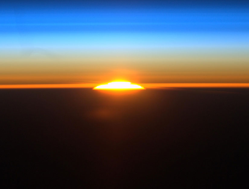 Click to enlarge Sunset/Sunrise in Space
