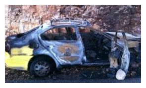 Click to enlarge Palestinian taxi burned