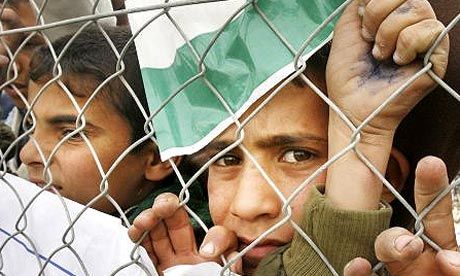 children behind fence/ Gaza