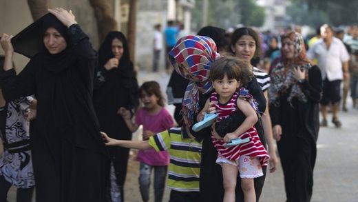 Click to enlarge Palestinian families in flight
