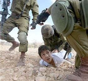 student subjugated by Israeli army