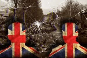 UK flags on broken glass background