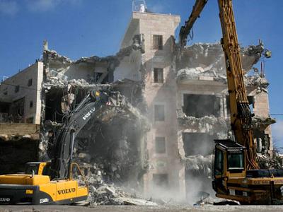 Click to enlarge House demolition