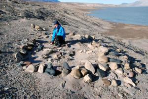 Astrid Lyså in August 2007 in the ruined settlement left by the Independence I Culture in North Greenland