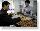 Chinese consumers buying eggs