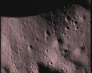 Click to enlarge close-up picture of the moon's surface