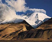 Click to enlarge Naimona'nyi's frozen ice cap