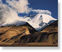 Click to enlarge Naimona'nyi's frozen ice cap