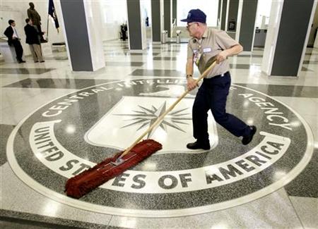 CIA logo man mop broom